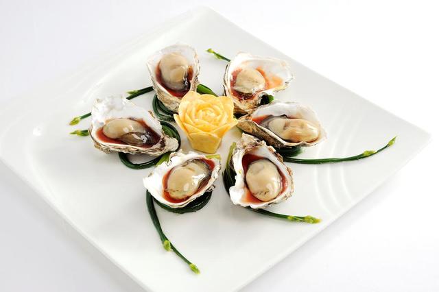 Fresh Oysters jelly with tomato sauce